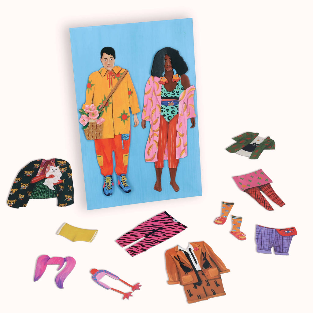 Close-up of interchangeable outfits and accessories for dolls
