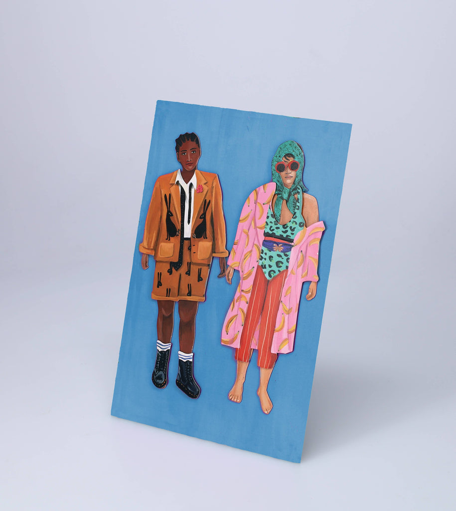Close-up of interchangeable outfits and accessories for dolls