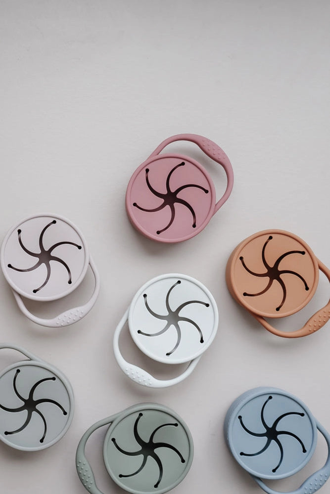 Grey snack cup with lid from a different angle