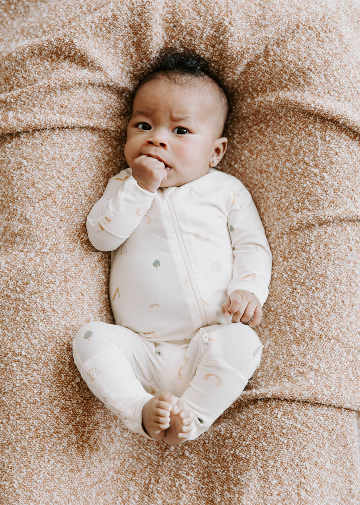 Baby Tencel Lyocell Footy Pajamas with Playground Print | Cream