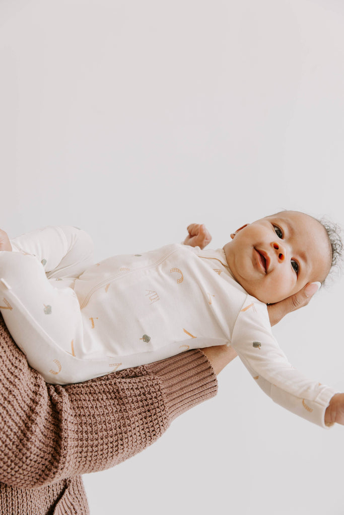 Baby Tencel Lyocell Footy Pajamas with Playground Print | Cream