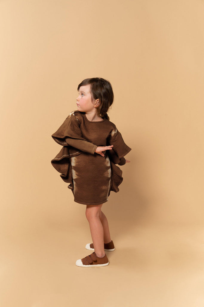 Girls tie dye dress in brown with ruffled cape sleeve, flat lay